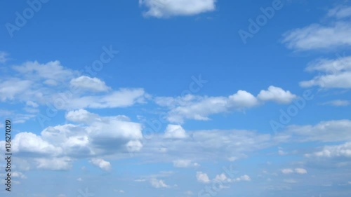 White clouds in the blue sky. Timelaps