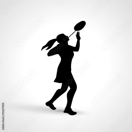 Creative silhouette of female badminton player