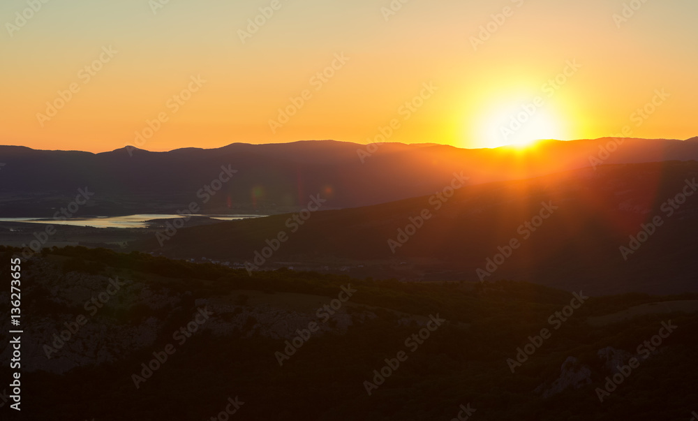 Sunrise over mountains of Southern Crimea. View from top of the mountain Ilyas Kaya. Sunrise over mountains of Southern Crimea. View from top of the mountain Ilyas Kaya.