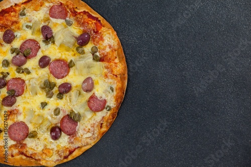 Delicious italian pizza served on grey background