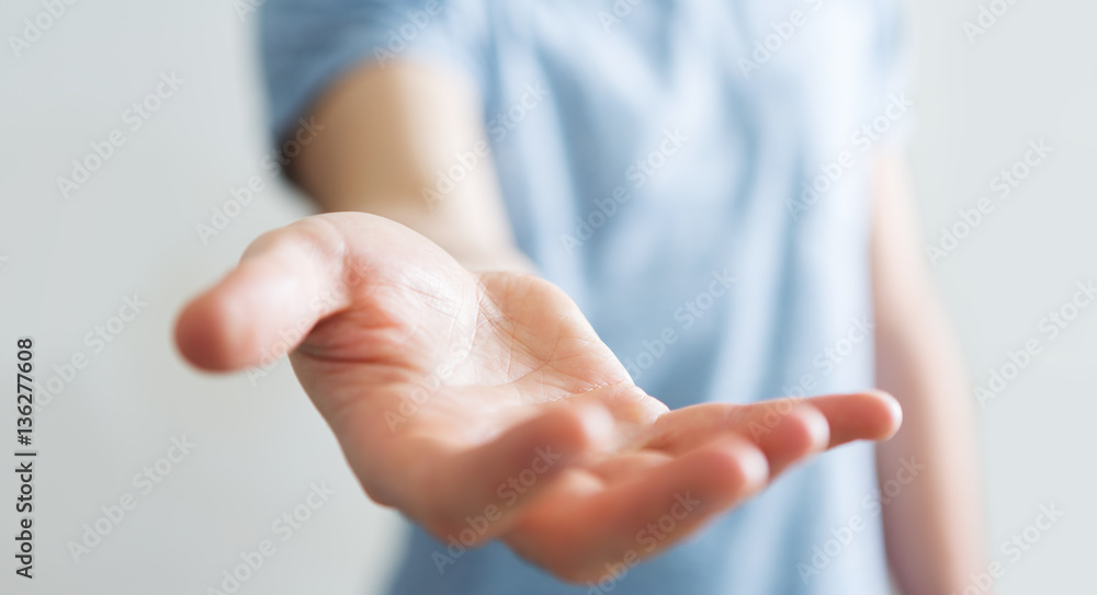 Businessman showing his empty hand Businessman showing his empty hand
