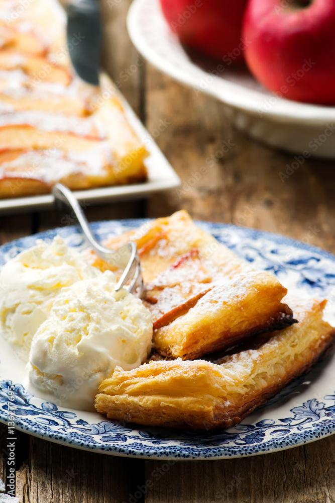 Apples puff tart with ice cream .selective focus. Apples puff tart with ice cream .selective focus.