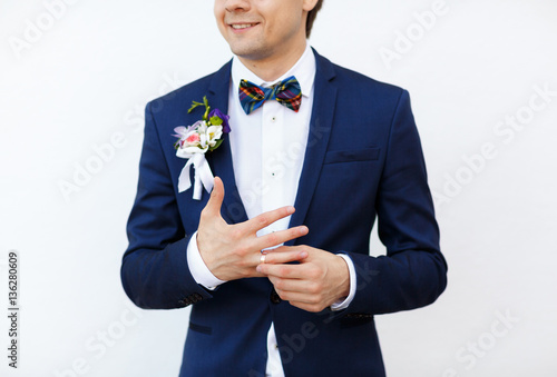 young groom feels the joy of your wedding day