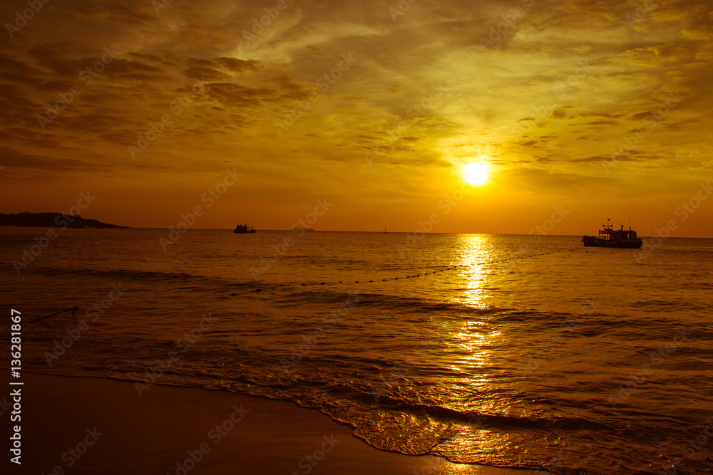 Sunrise on the beach with boat, Vacation concept