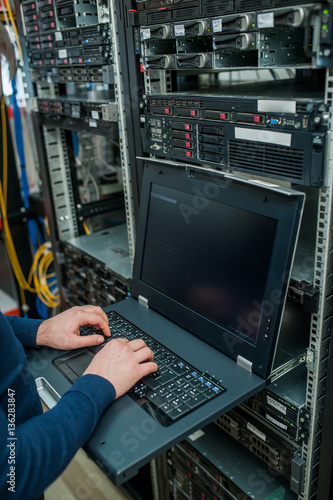 network engineer working in server room