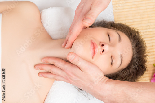 beautiful woman on massage in a professional beautician
