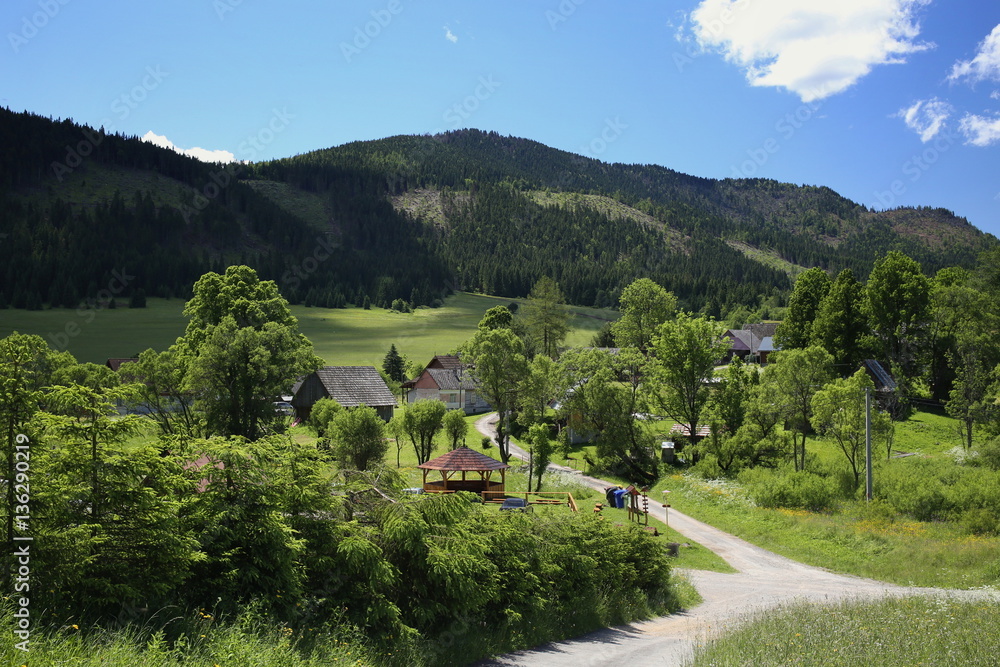 Europe, country Slovakia, region of Liptov, mountain village Velke Borove. Kvacianska and Prosiecka valley. Old wooden houses on the mountain meadows Europe, country Slovakia, region of Liptov, mountain village Velke Borove. Kvacianska and Prosiecka valley. Old wooden houses on the mountain meadows
