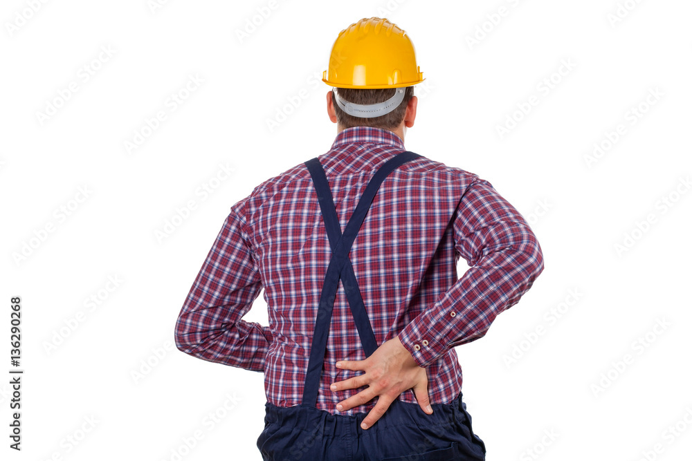 Young male engineer having backpain Young male engineer having backpain