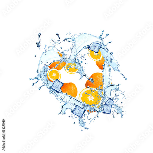 Fototapeta Naklejka Na Ścianę i Meble -  Splash with orange isolated on white background. Abstract water with fresh fruits. 