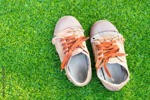 brown sneakers on the lawn
