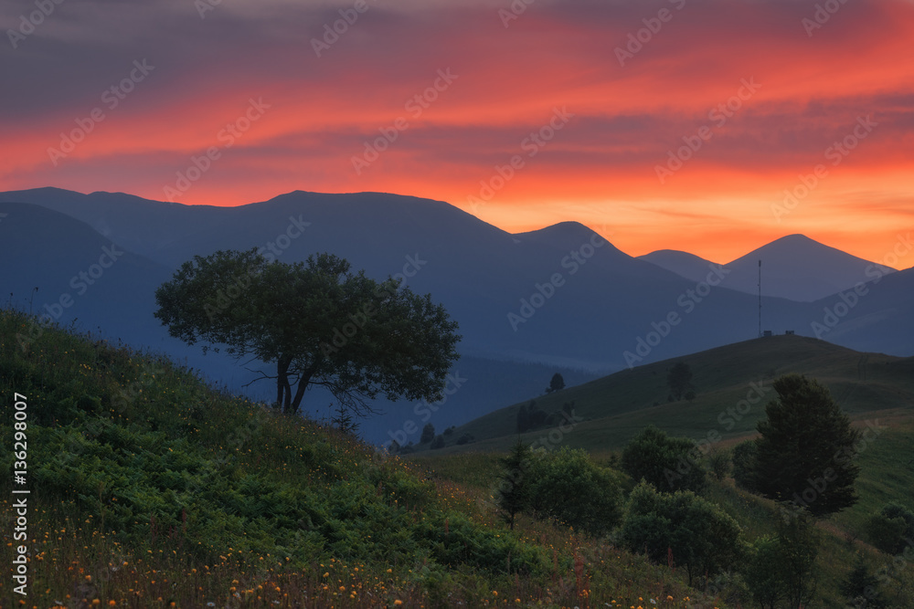 Ukraine. Carpathians. Dzembronya. Sunset sky in the mountains Kosarische
