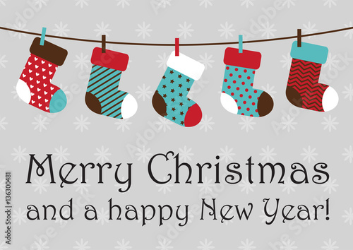 vector illustration of christmas socks hanging on rope