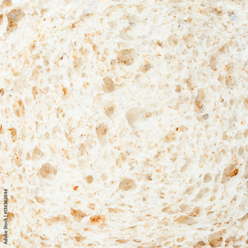 Fresh, healthy slice of bread close - food background