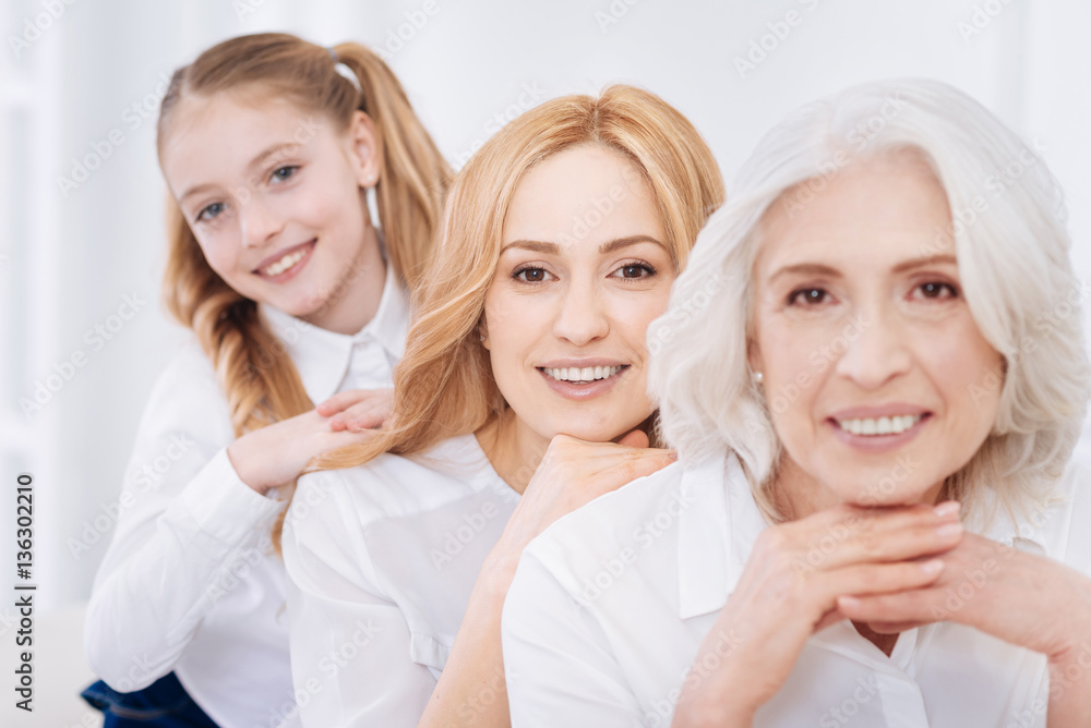 Cheerful family resting together at home Cheerful family resting together at home