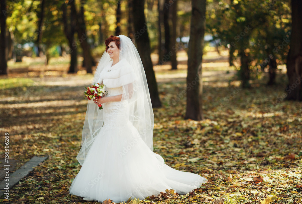 amazing bride walking in a green park amazing bride walking in a green park