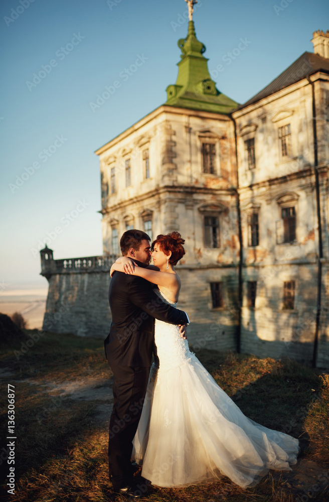 bride and her man wandering the streets of a big city