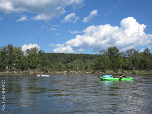 Kayaking and fishing down the river, Sayan mountains, Siberia, Russia