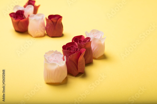 Valentines day roses on yellow background