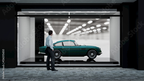 Schaufenster mit klassischem Automobil und Besucher photo