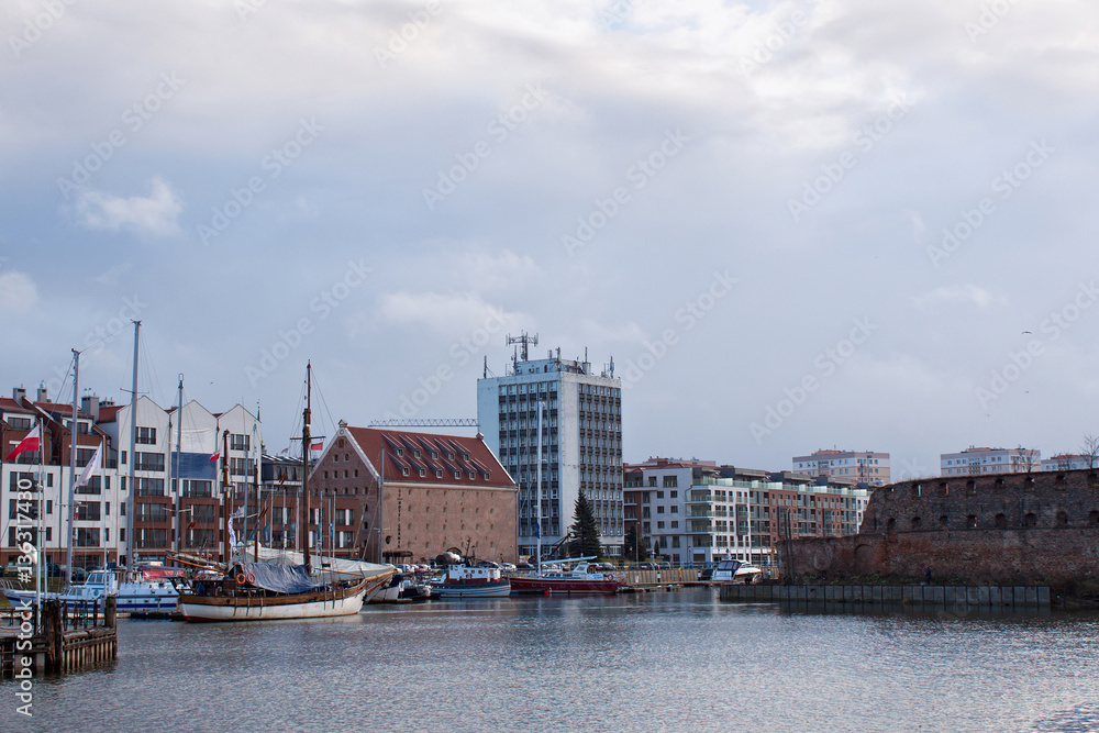 View of the marina in Gdansk on the Motlawa river with small ships in the city center. Poland.