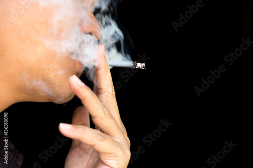 Unidentified man smoking a cigarette