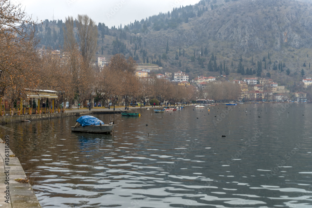 Fishing boats at the magnificent lake of Kastoria, Greece during Fishing boats at the magnificent lake of Kastoria, Greece during