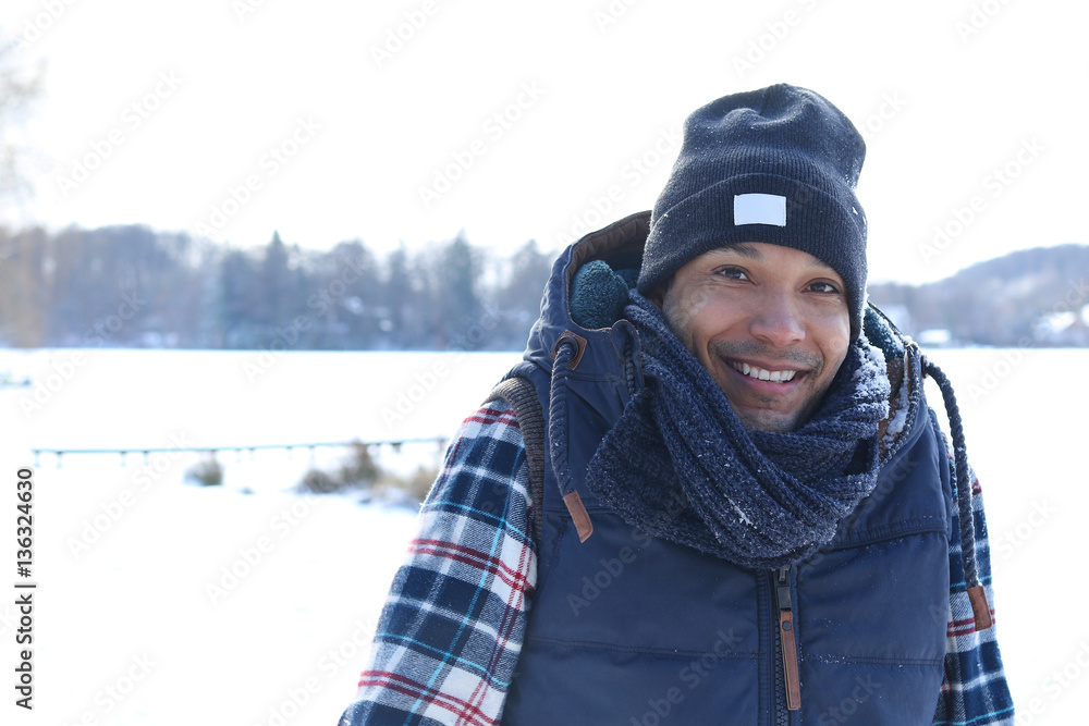 Handsome interracial man in winter