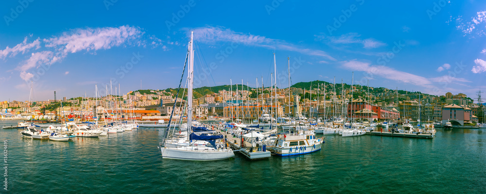 Panorama of marina Porto Antico Genova, where many sailboats and yachts are moored, Genoa, Italy.