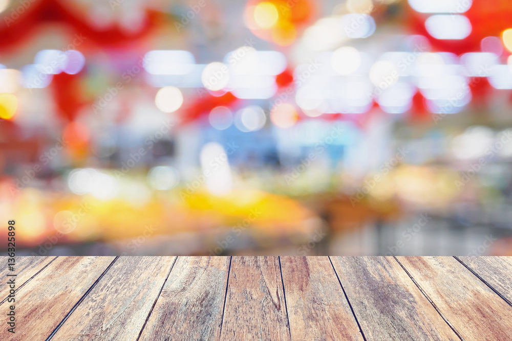 wood table with abstract supermarket blurred background wood table with abstract supermarket blurred background