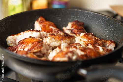 Fried Chicken Cooking in an pan closeup