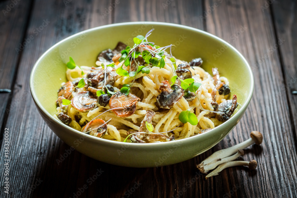 Closeup of spaghetti with mushrooms and parsley