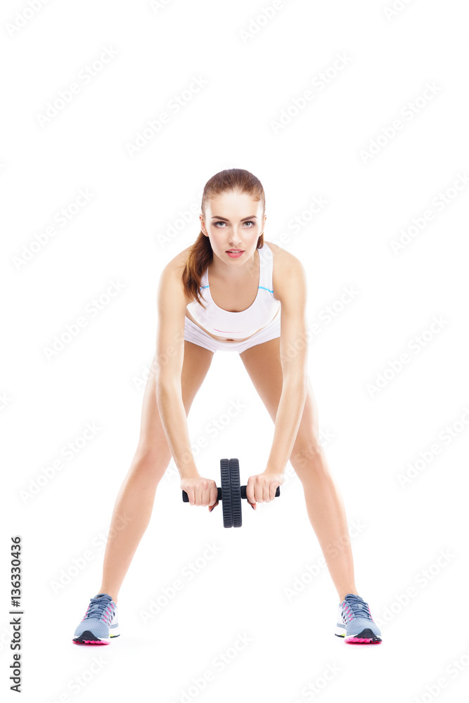 Fit, healthy and sporty woman in sportswear isolated on white. Fit, healthy and sporty woman in sportswear isolated on white.