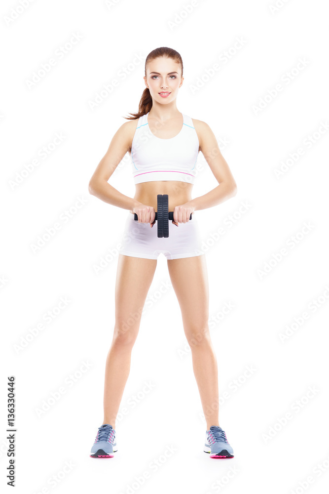Fit, healthy and sporty woman in sportswear isolated on white. Fit, healthy and sporty woman in sportswear isolated on white.