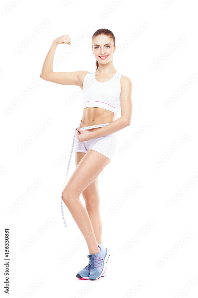 Fit, healthy and sporty woman in sportswear isolated on white. Fit, healthy and sporty woman in sportswear isolated on white.