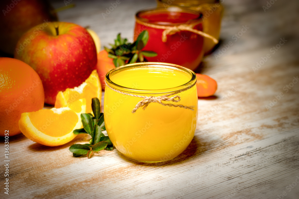 Healthy fresh orange juice on rustic table Healthy fresh orange juice on rustic table