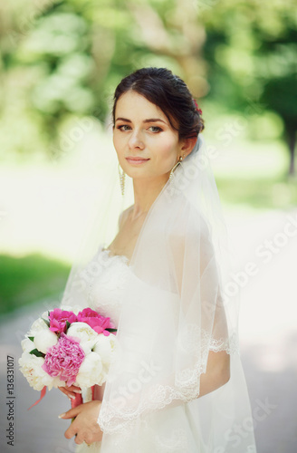 Atmospheric photo of the bride in the amazing bridal dress