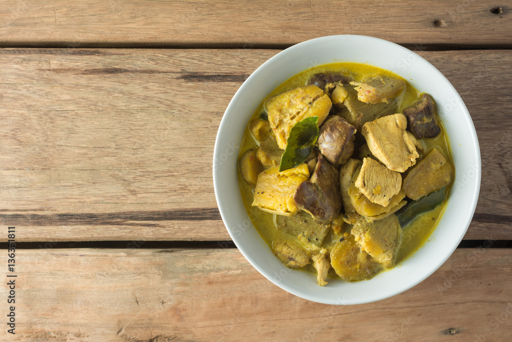 Chicken Curry with Eggplant on wooden table. Chicken Curry with Eggplant on wooden table.