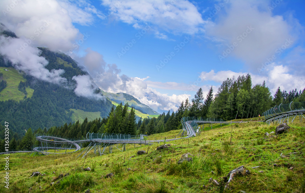 Recreation with alpine coaster in Alps, Tirol, Austria