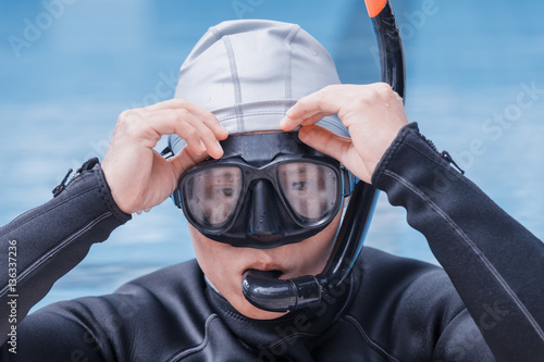 Free diving training on swimming pool