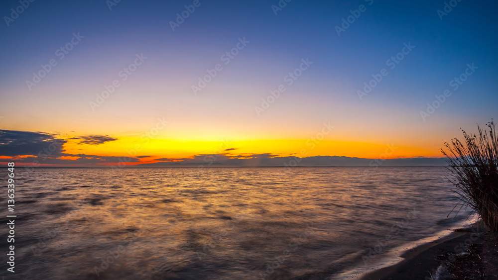 Colorful sky and water in lake Paliastomi in morning , Poti, Geo