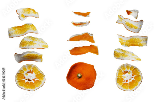 Abstract composition of orange peel pieces, clipping path included to remove the background with ease.