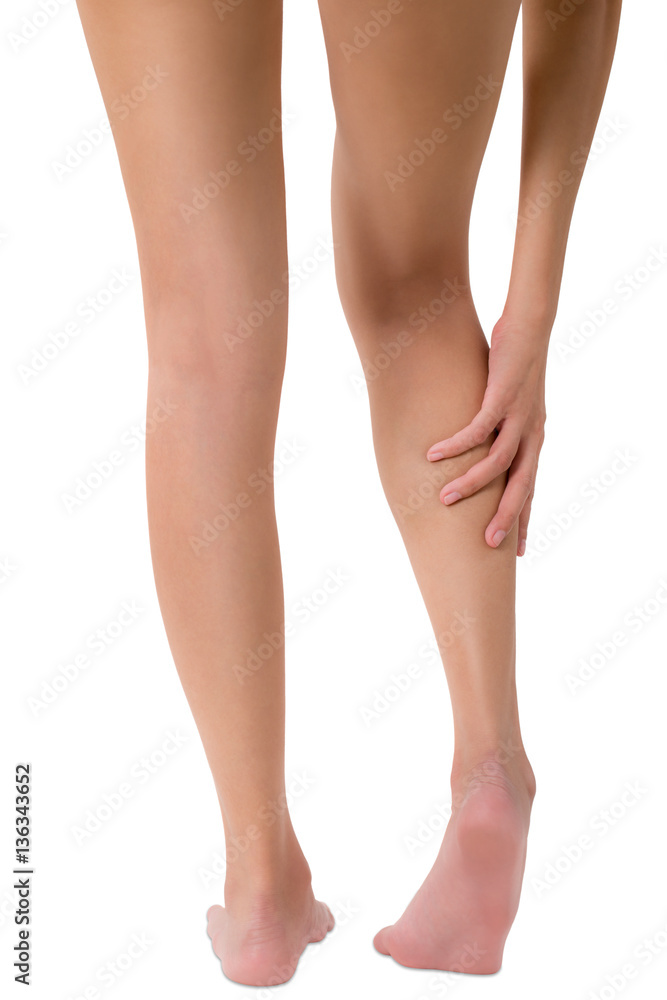 Woman massage her leg and calf on pain area isolated on white background Woman massage her leg and calf on pain area isolated on white background
