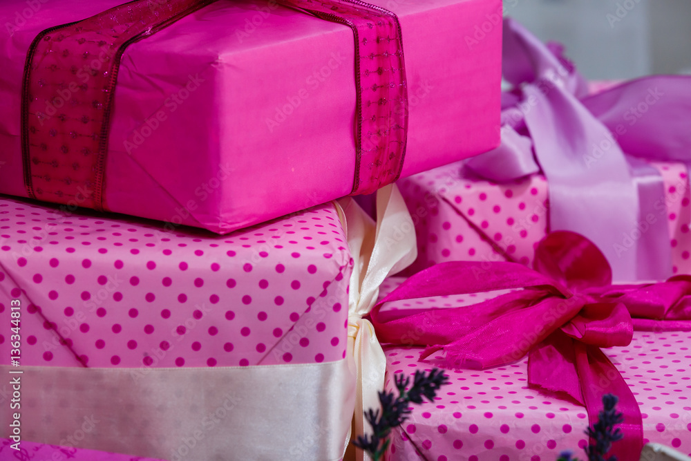 Pink gift boxes with ribbon bow collection. Holiday present. Objects isolated on white background Pink gift boxes with ribbon bow collection. Holiday present. Objects isolated on white background