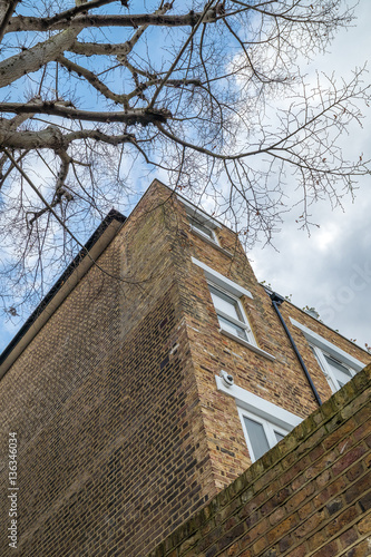Facade of a flat bluiding in central London photo