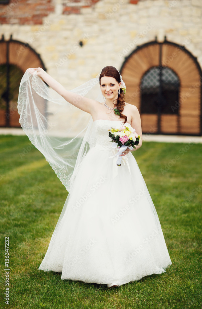 Fototapeta premium Lovely bride with flowers