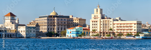 Photography Panoramic view of Old Havana in Cuba with several seaside colorful buildings and