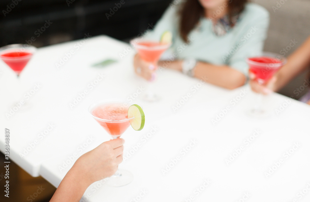 women drink cocktails at the restaurant celebrating women drink cocktails at the restaurant celebrating