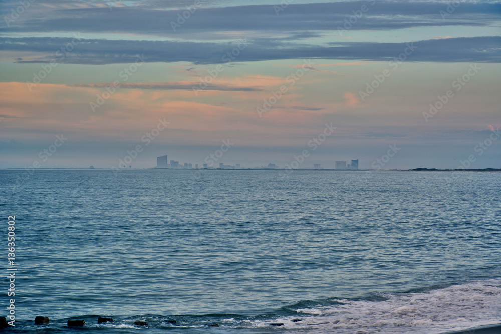 Sunrise at Shore with Atlantic City in the Distance