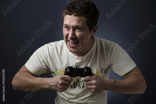 young man playing video games