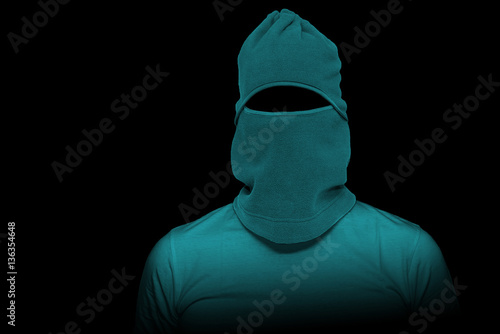 Einbrecher mit grüner Maske ohne Gesicht
